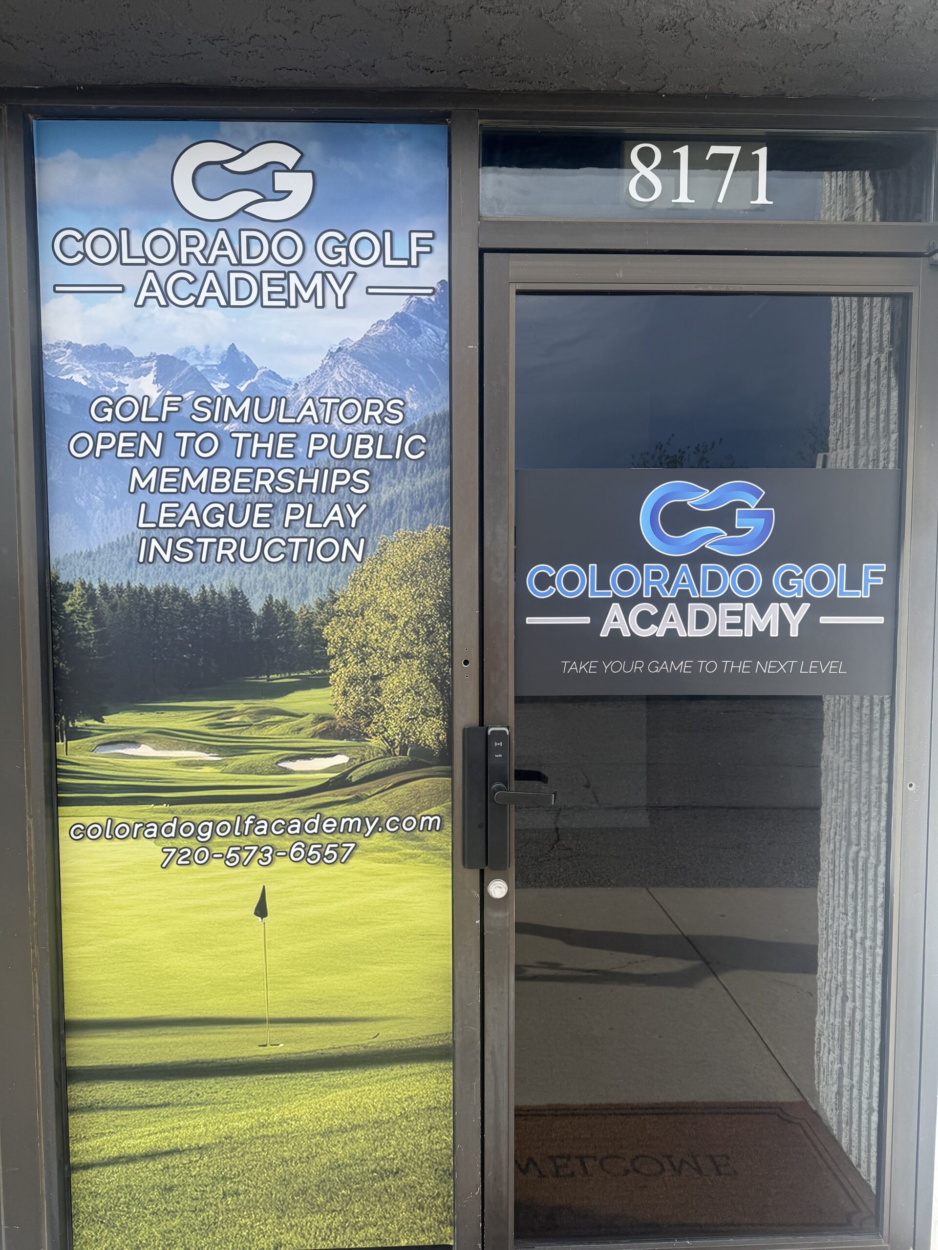 The front glass door with the text "Colorado Golf Academy."